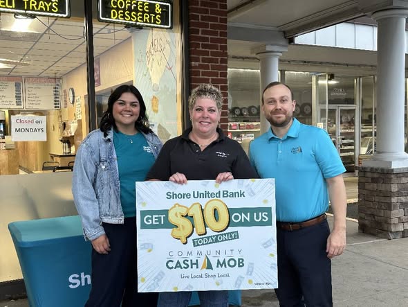 father and daughter playing on the living room floor 